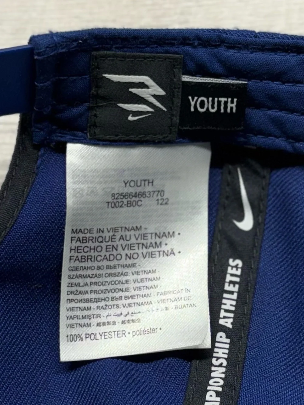 Nike 3Brand Kids Navy Hat with Orange Emblem (Russell Wilson)